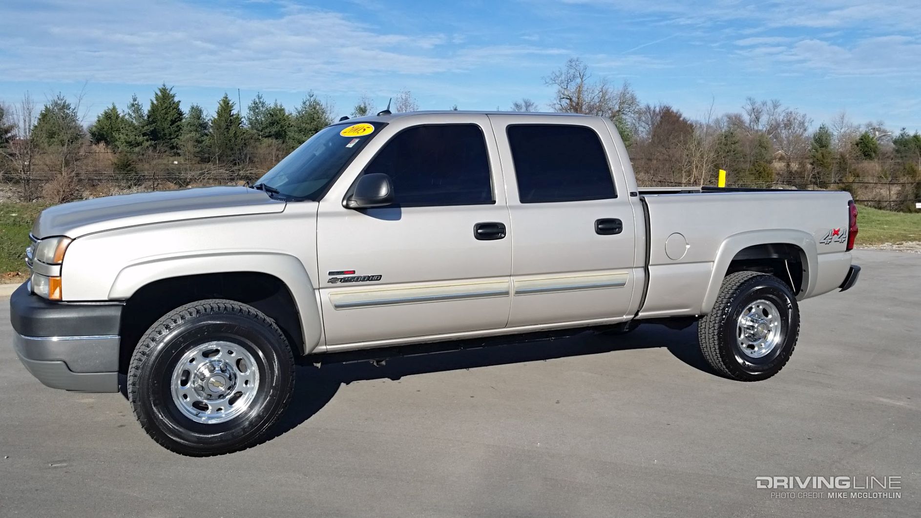 Silver Chevy 2500 truck