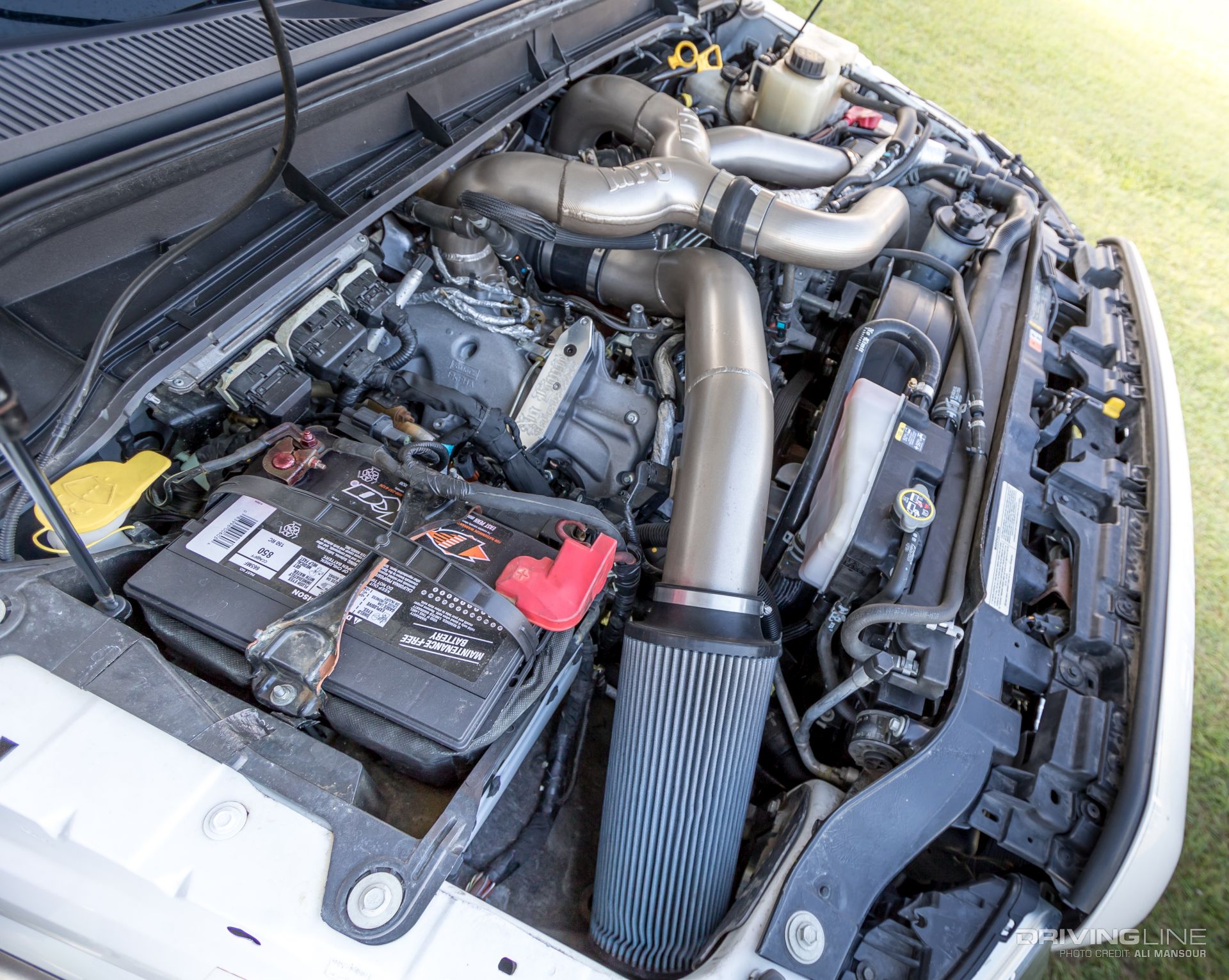 2011-Ford-F250-24-Moto-Metal-Wheels-40-Trail-Grapplers-8-inch-bds-lift