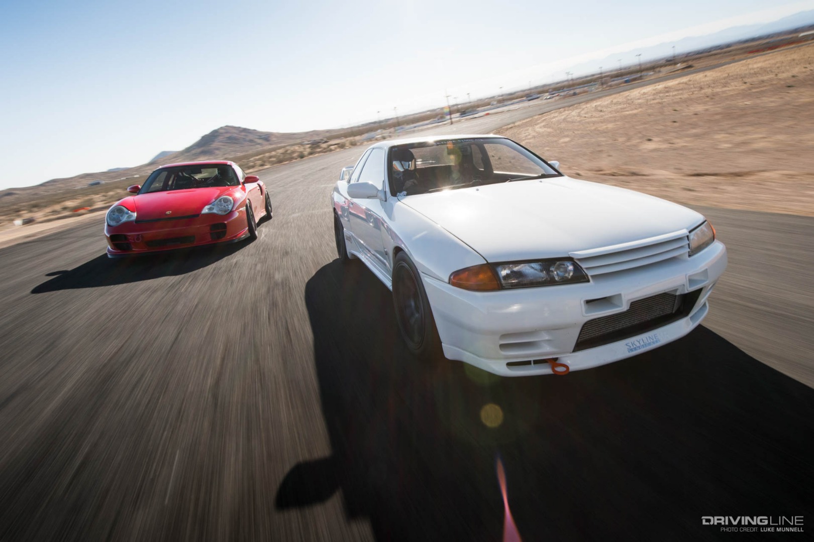 Driver Battles Porsche 996 Nissan GT-R