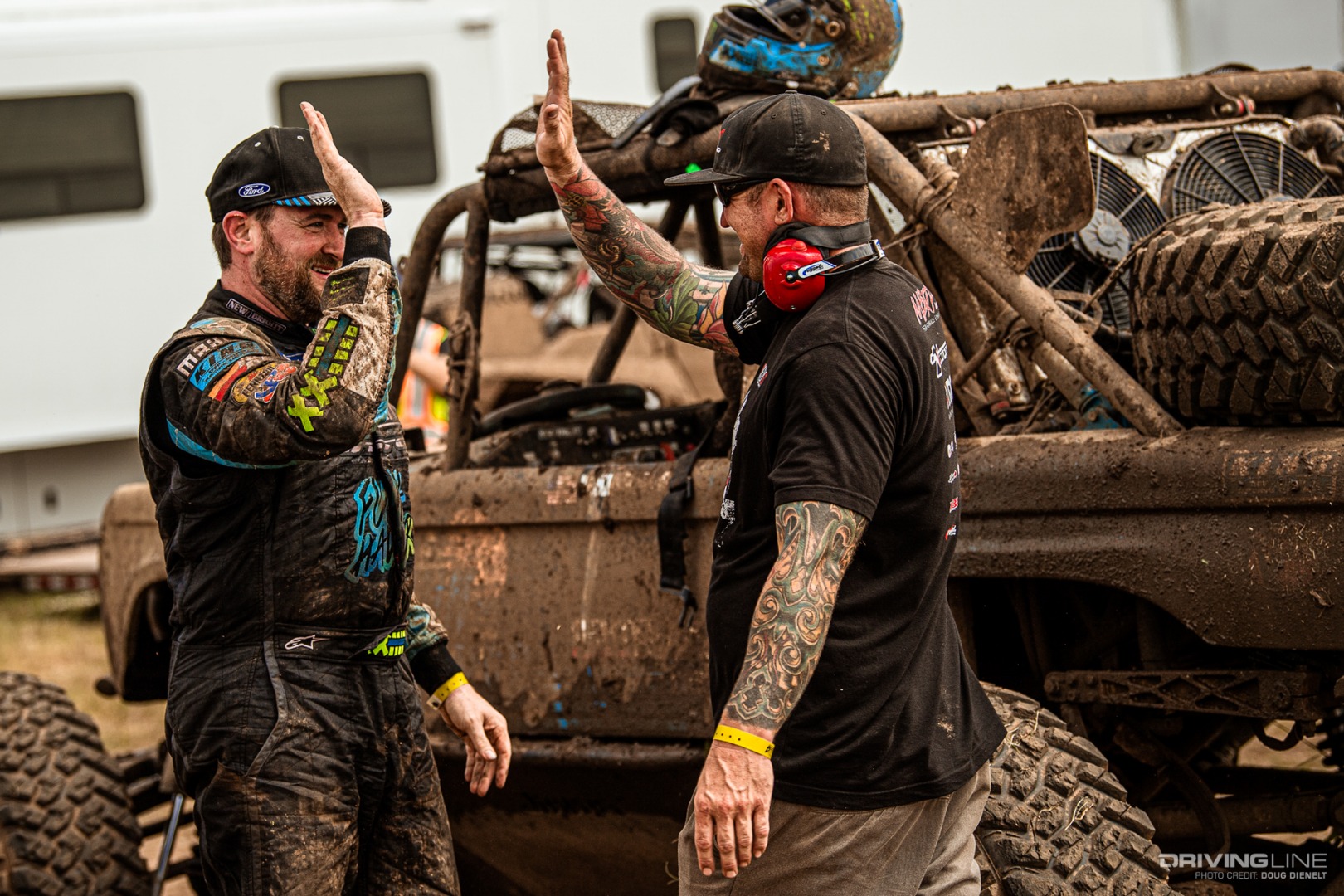 Vaughn Gittin Jr. high-fiving Loren Healy