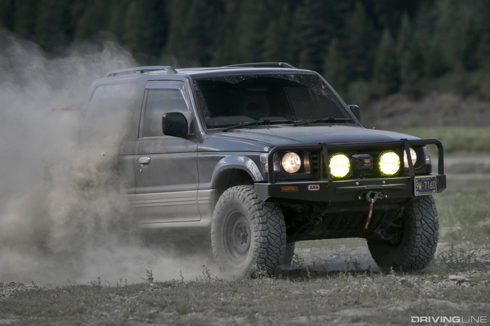 Mitsubishi Pajero rallying through Canadian's Minto silt bed