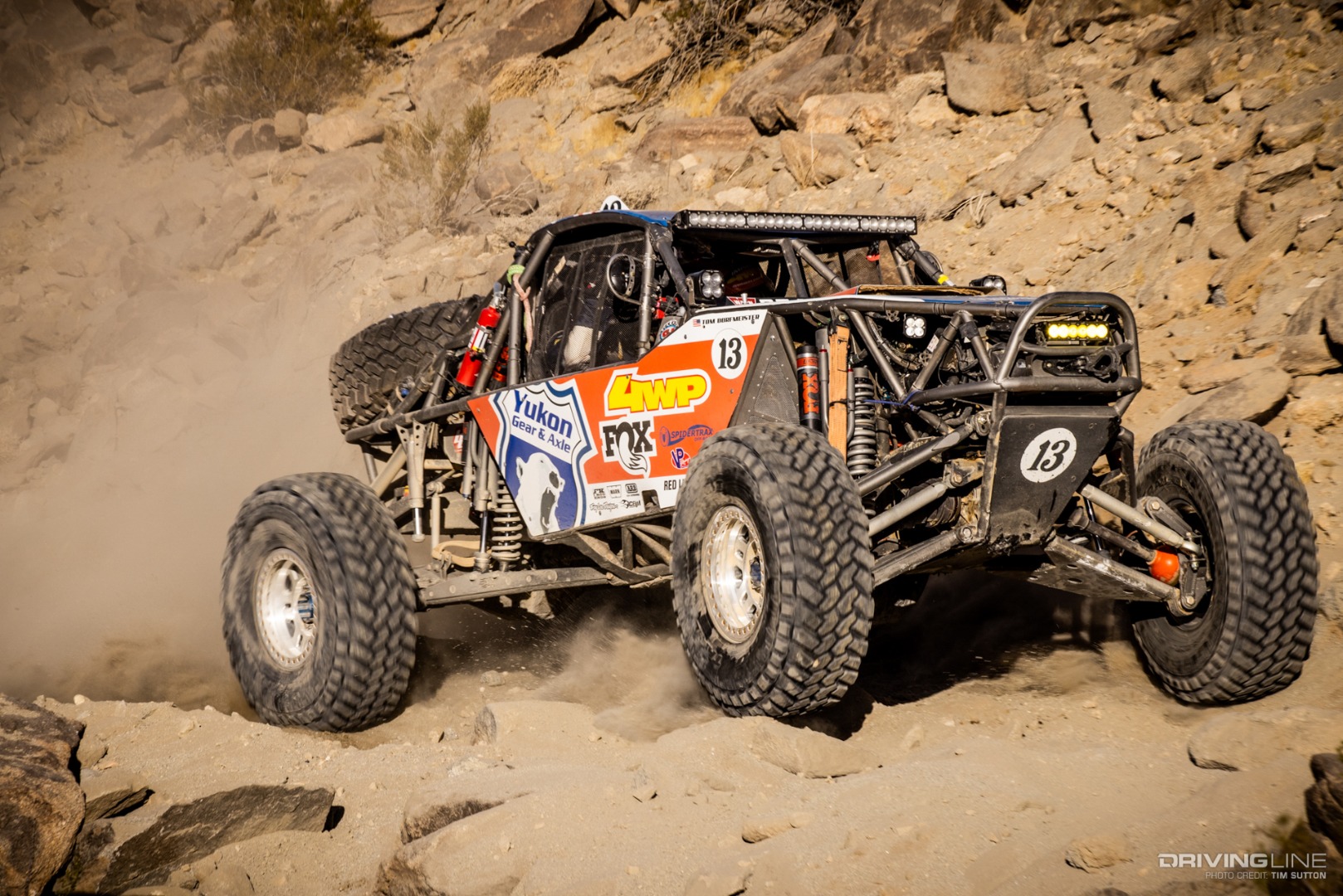 Bailey Cole driving up a hill