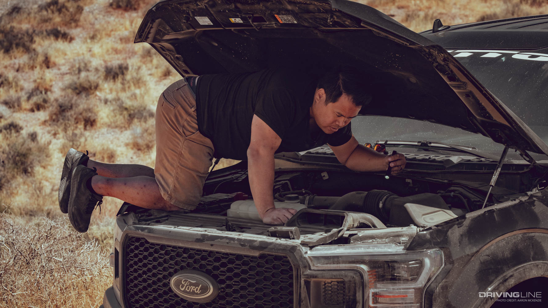 Geoff Tumang Working on his Ford F150 On The Trail