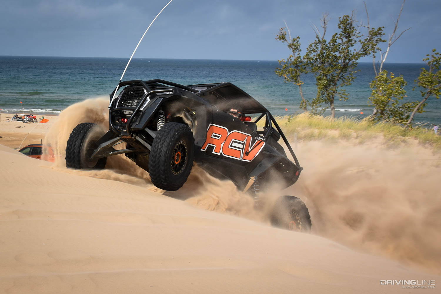 UTV driving on a sand dune