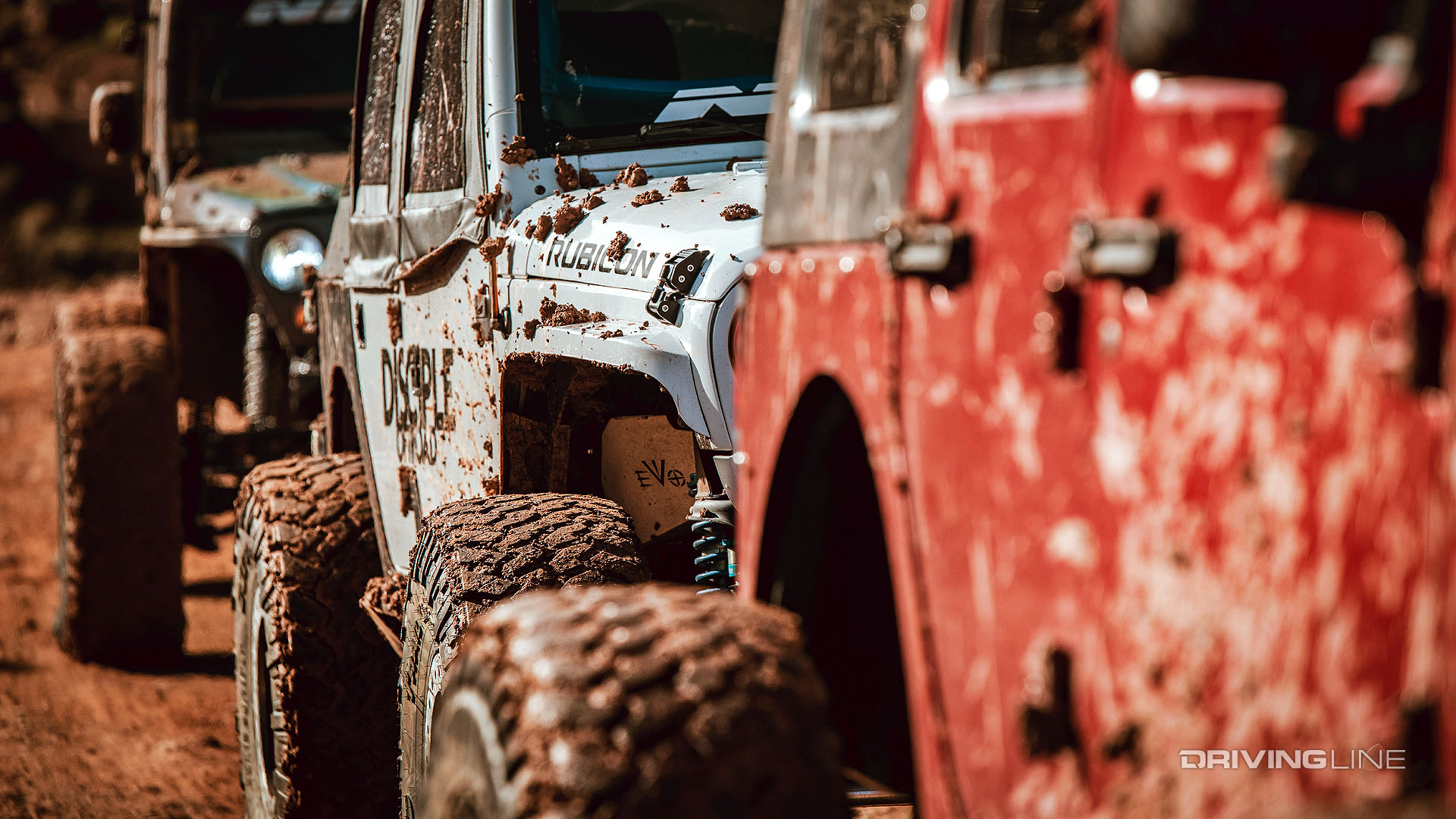 off-roading Jeeps in the mud in Moab UT