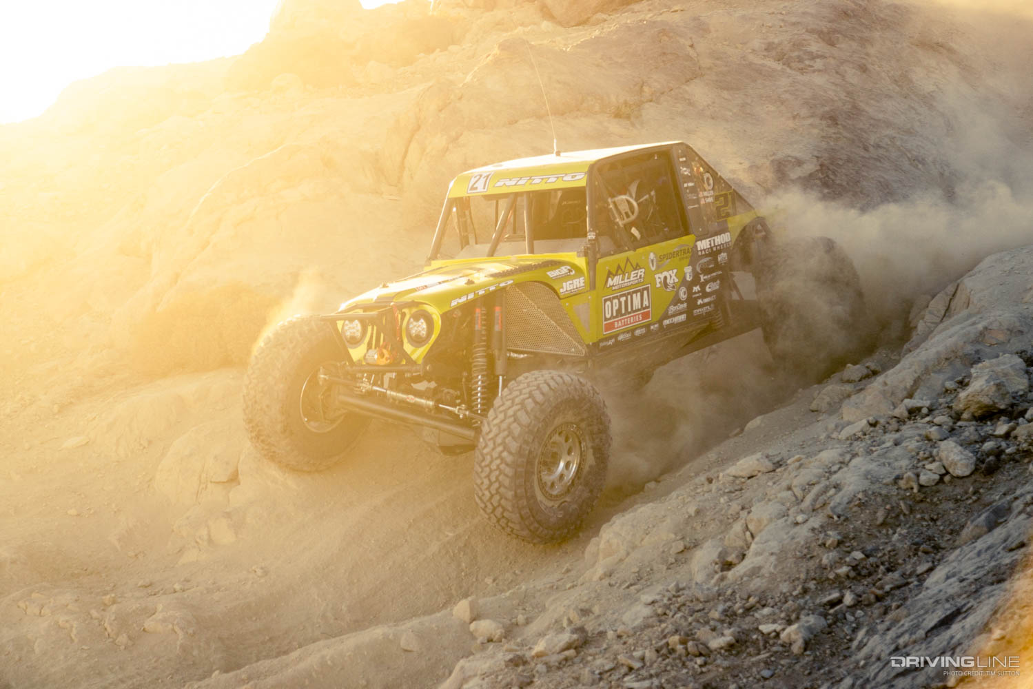 Erik Miller in a dusty area of an off road trail racing King of the Hammers Ultra4 2022