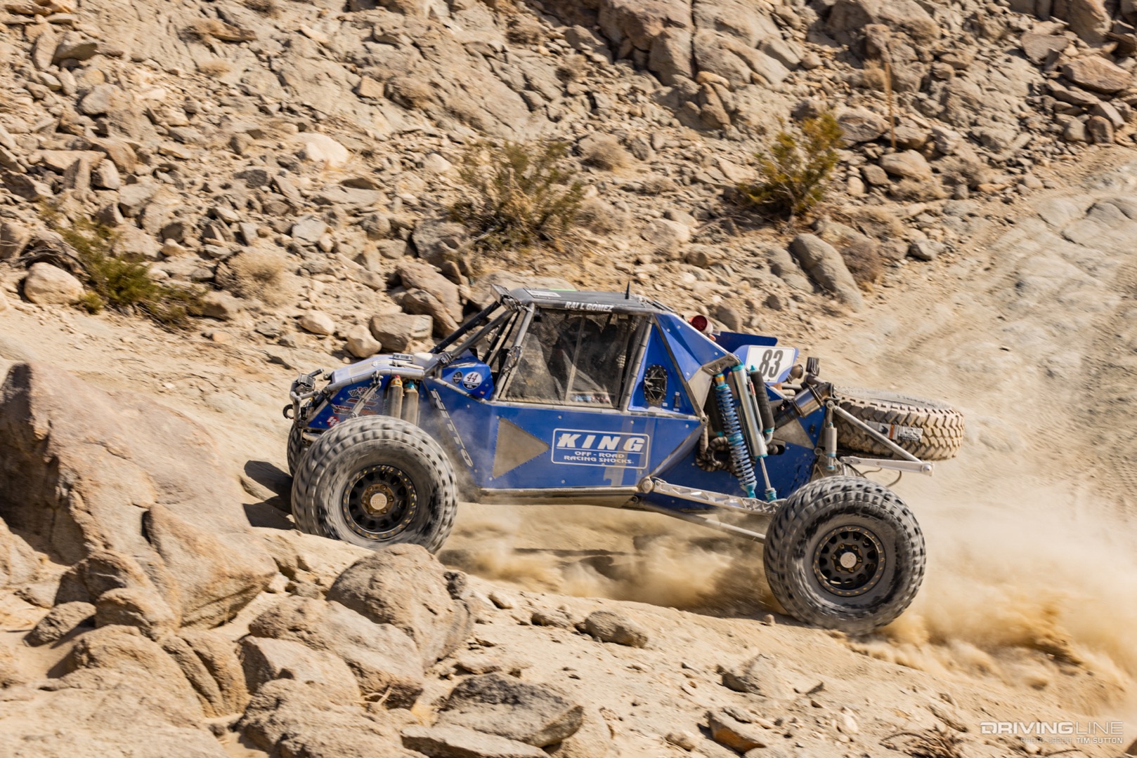 Raul Gomez climbing up a rock trail