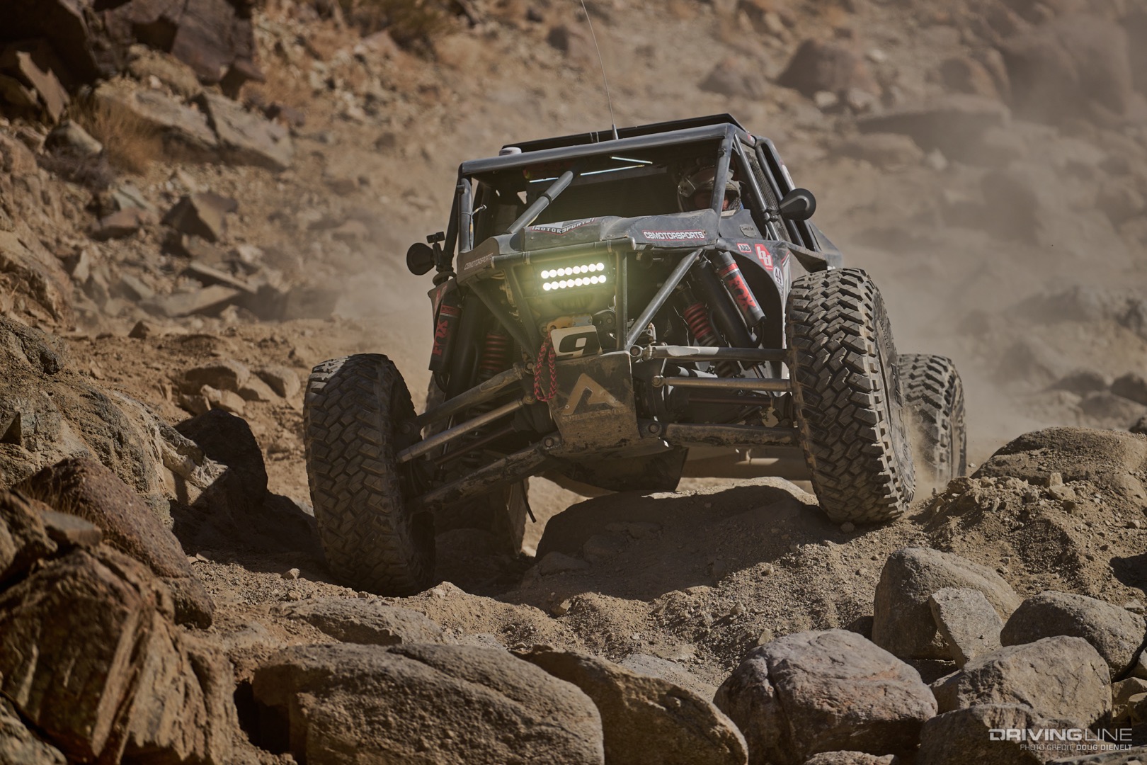 Bryan crofts driving through a rocky canyon