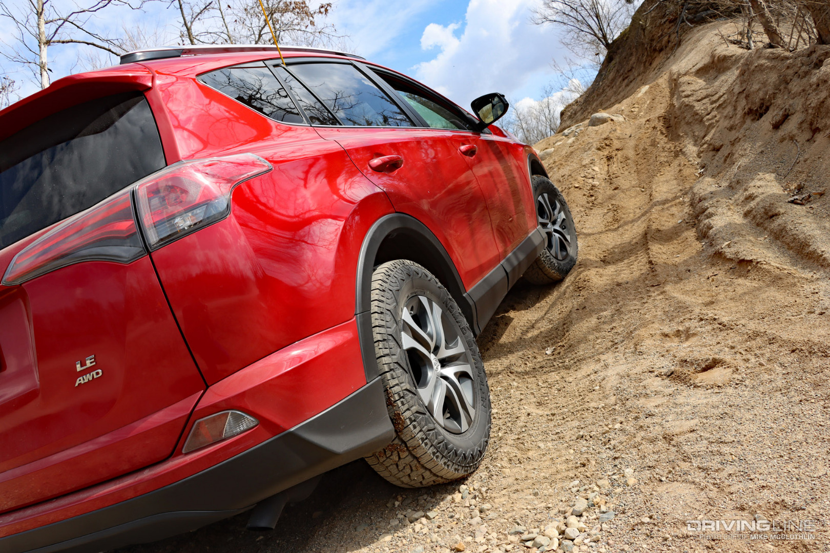 RAV4 climbing a hill off-road