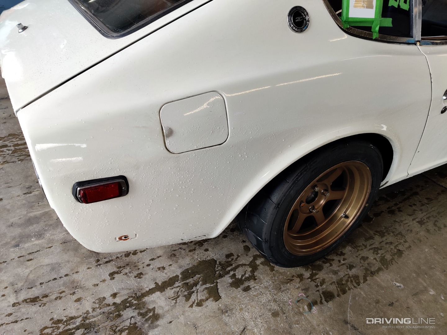 Datsun 280Z wet tire rear view