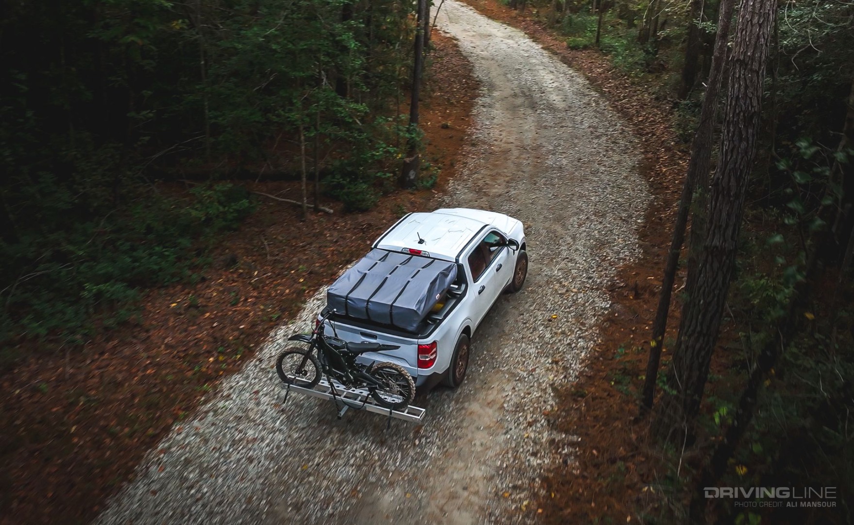 2022 Ford Maverick Hybrid XL Overland driving off-road in forest