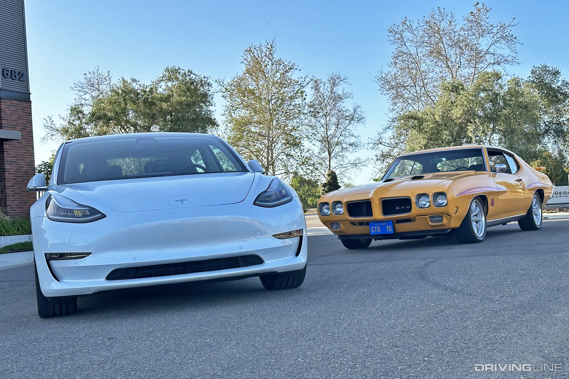Tesla Model 3 and 1970 Pontiac GTO