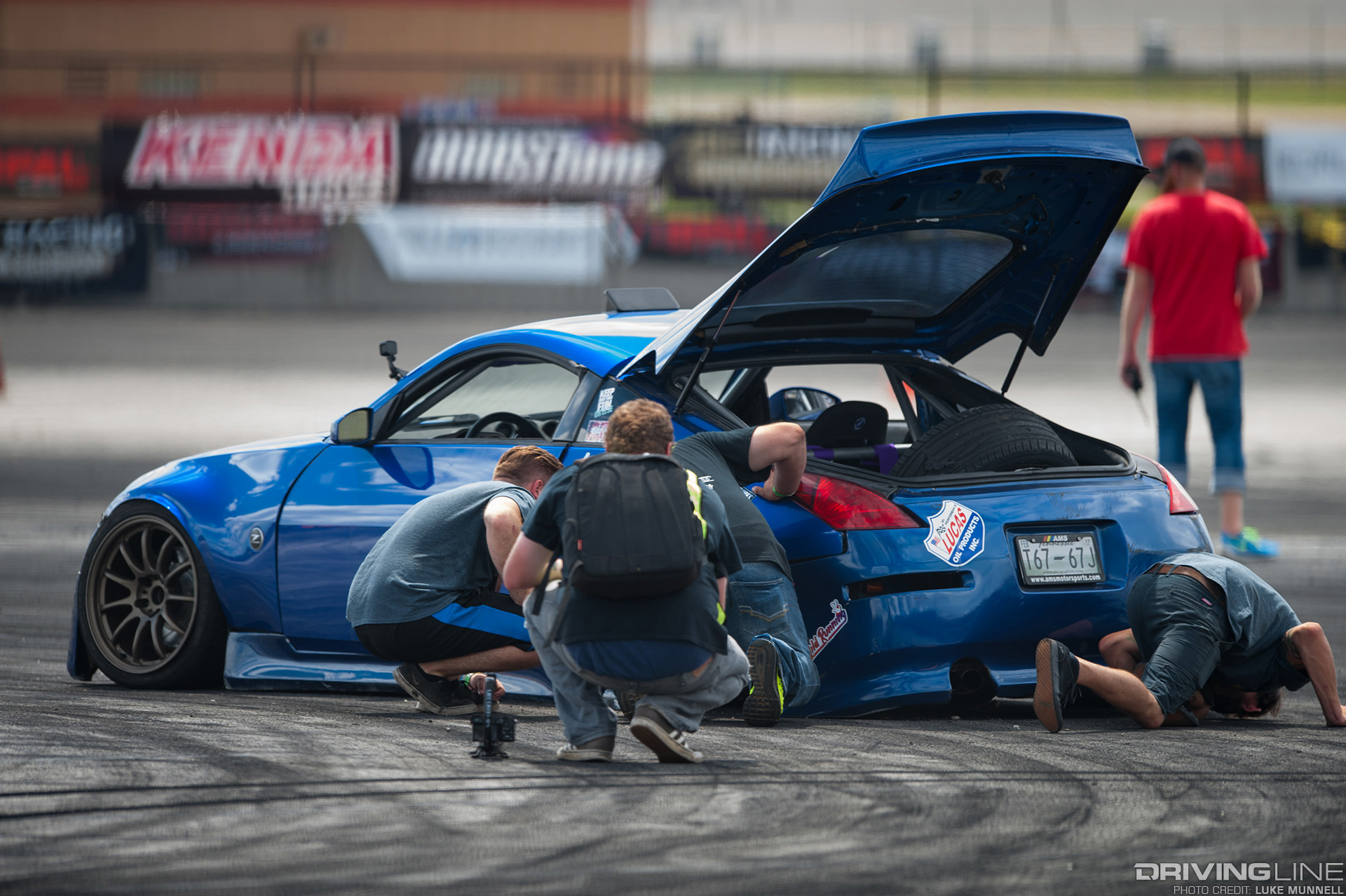 Jordan Painter in his Wild Running 350Z maintenance crew