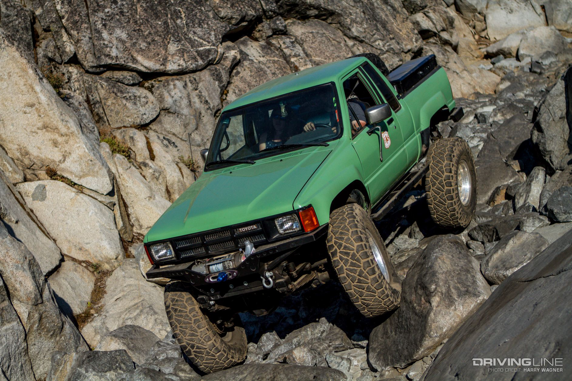 truck with Nitto Ridge Grapplers on the rocky Little Sluice of Rubicon Trail