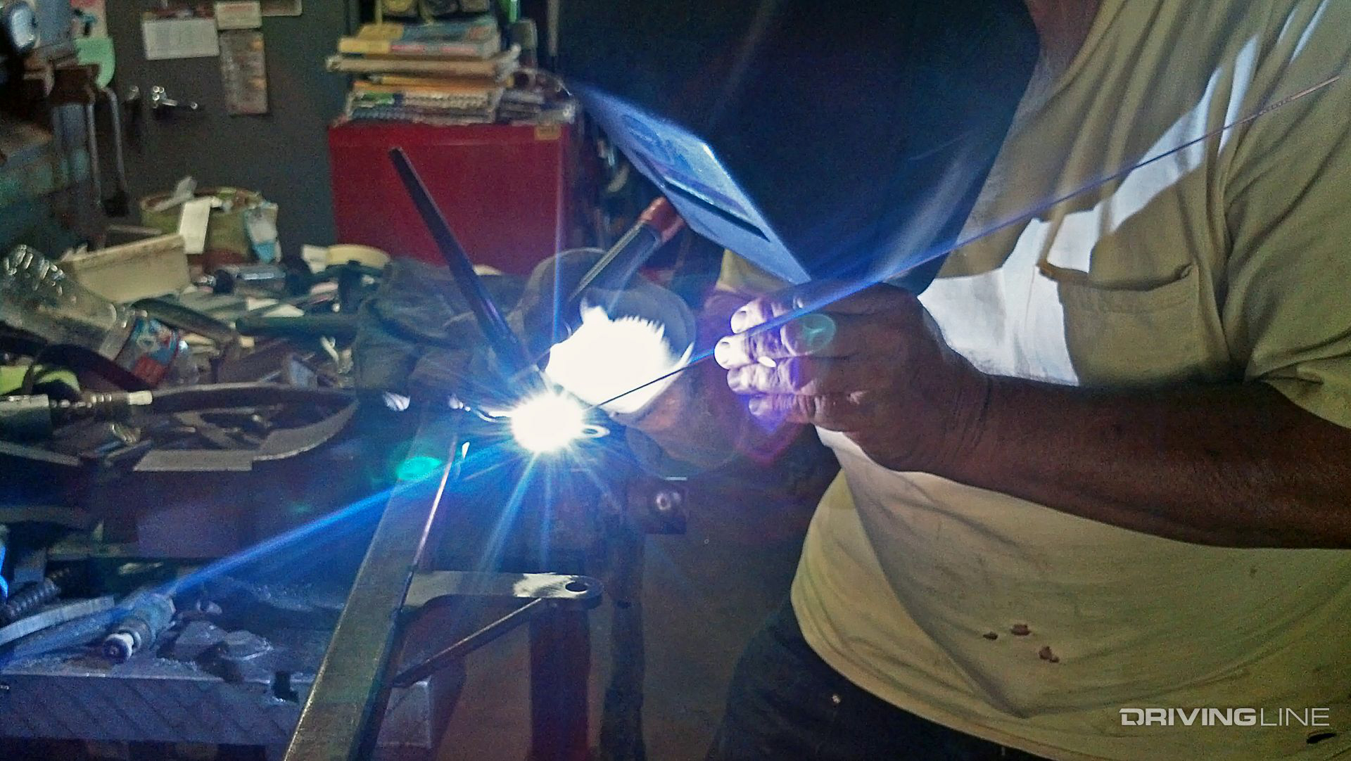 Fageol fabricating steel scrap into an OE-adapted rack for the PIAA light bar