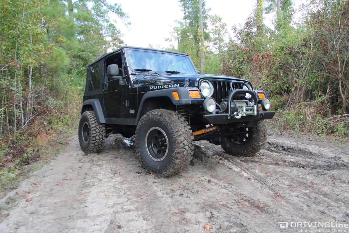 Jeep Wrangler TJ on a muddy trail