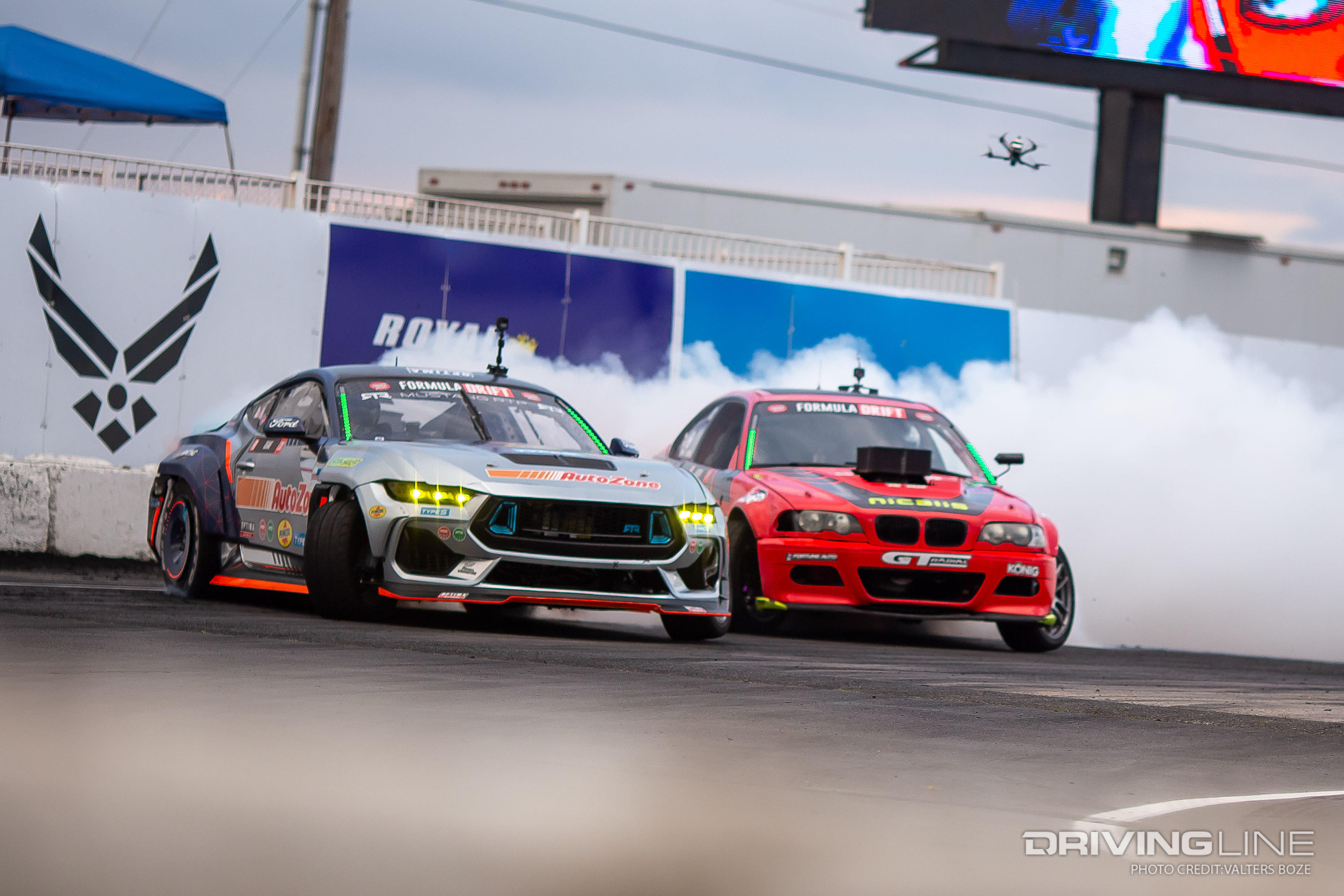 James Deane tandem drifting against Travis Reeder at 2023 Formula Drift New Jersey Englishtown Raceway