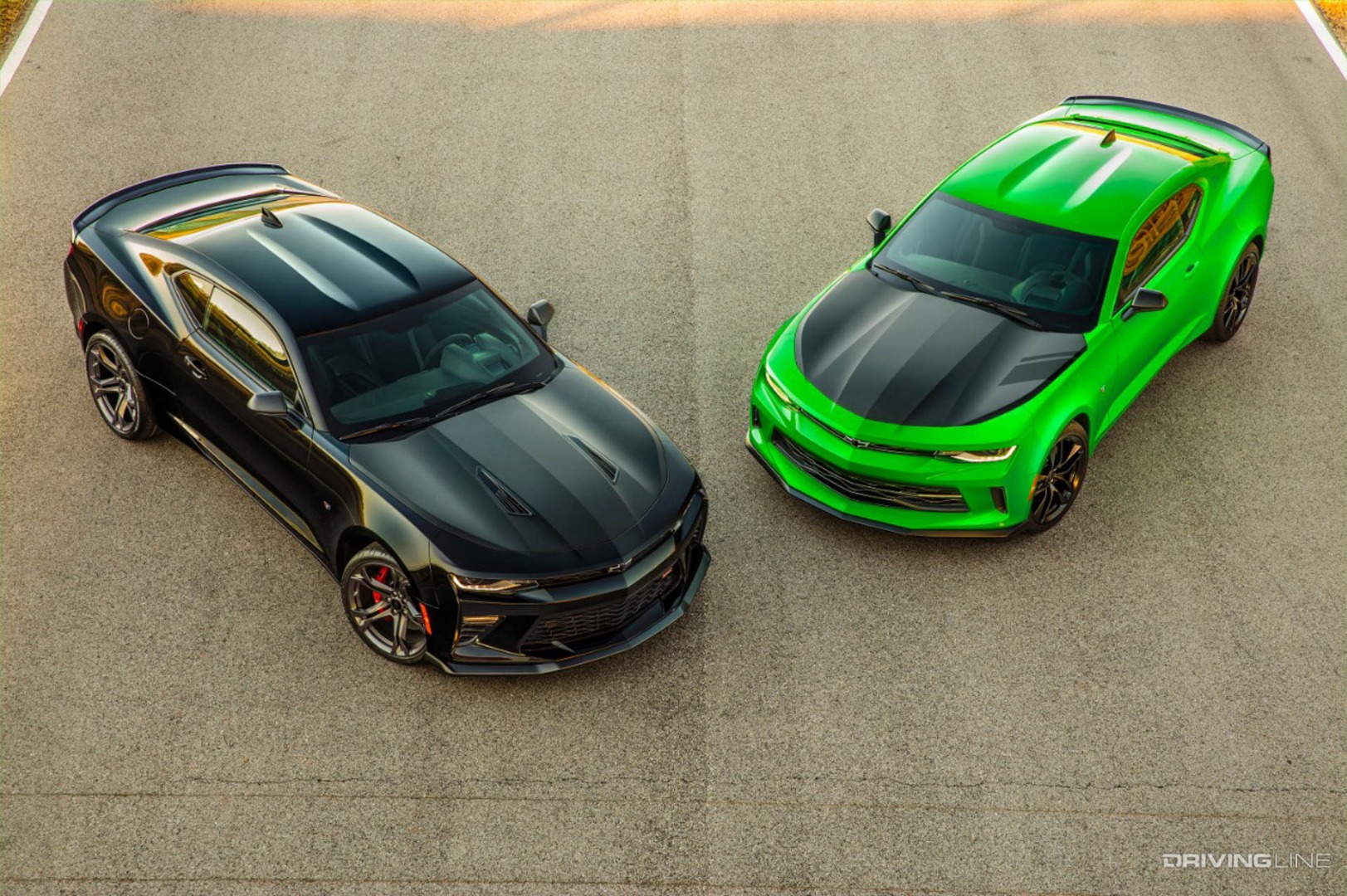 Black and green Chevrolet Camaros