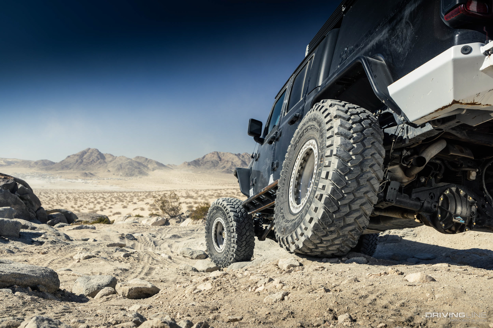 Close up of Nitto Trail Grappler tires on black Jeep Gladiator