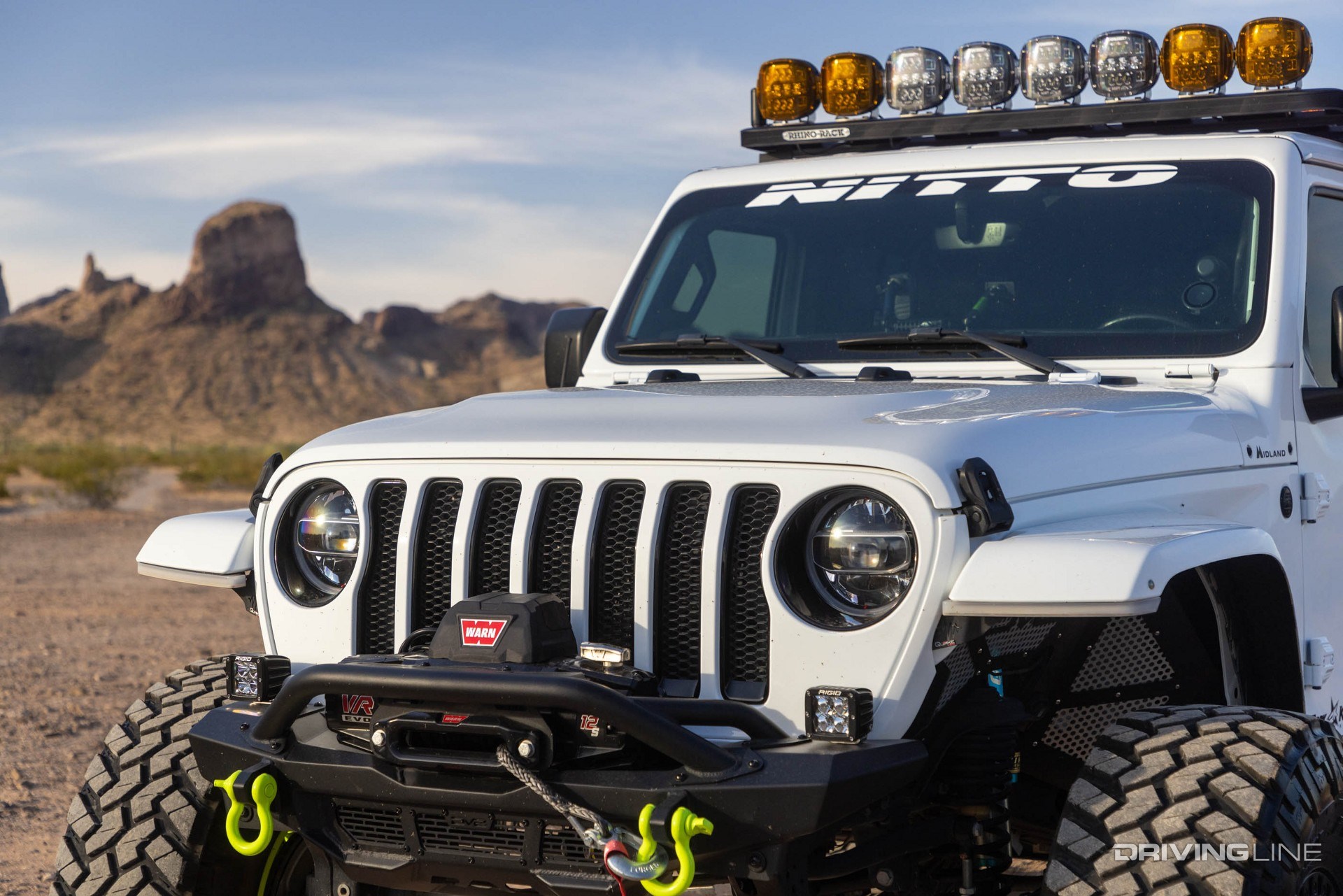 Jeep Wrangler on Nittos in desert with auxiliary lighting