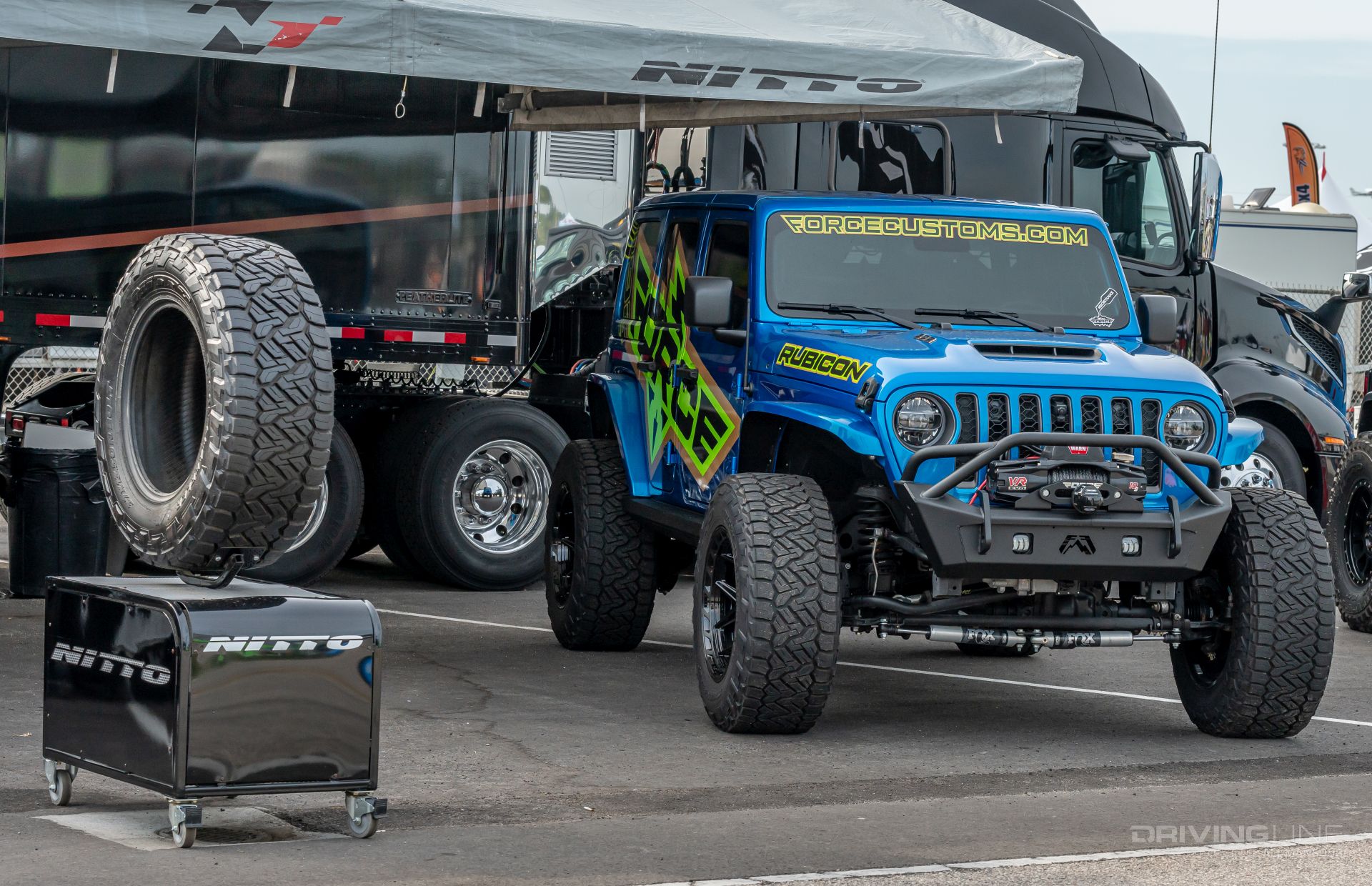 Nitto Tire Vendor booth at Daytona International Speedway Blue Wrangler 392 on Recon Grappler A/T